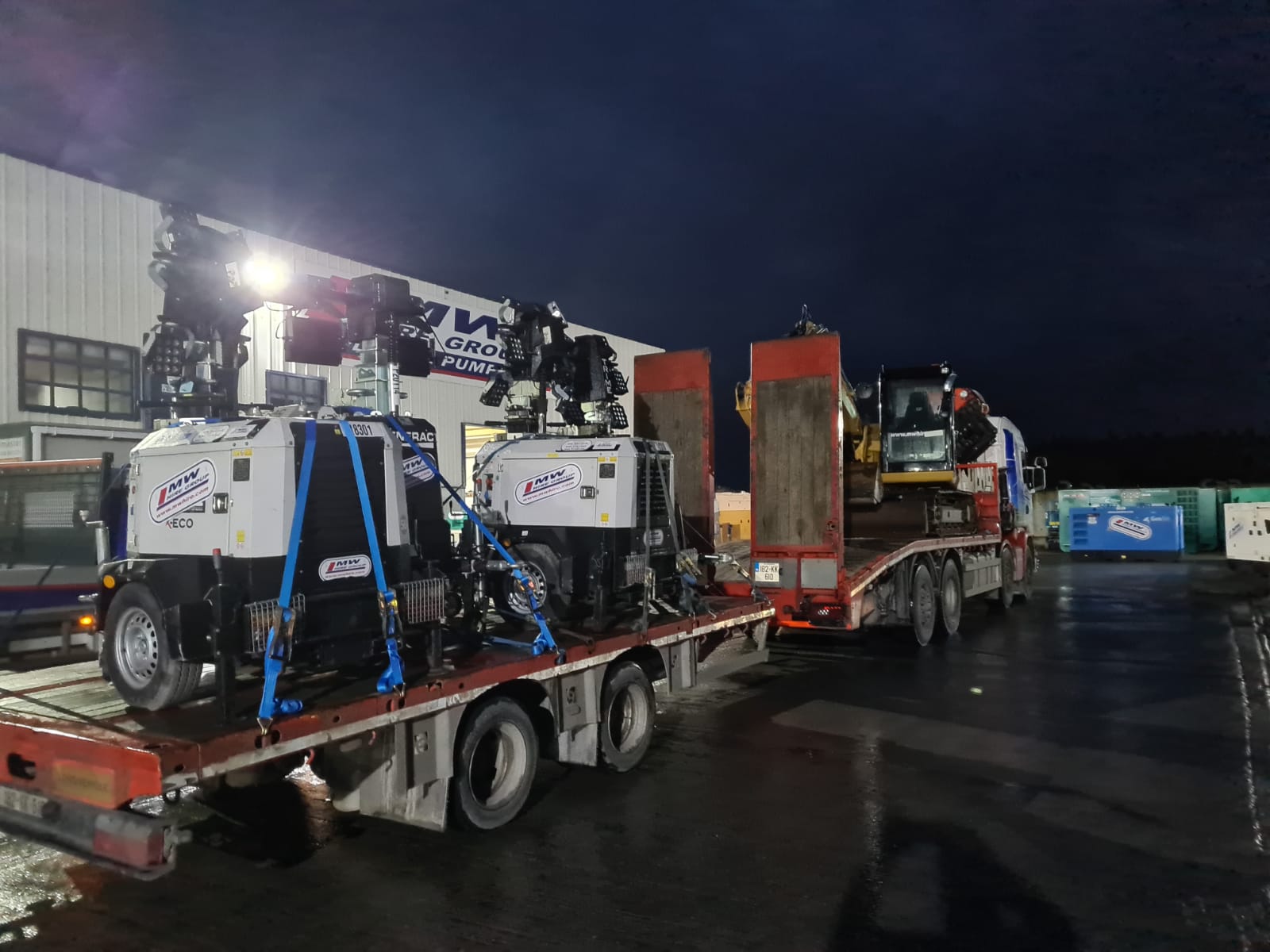 Lighting towers and an 8 ton CAT being delivered early to a rental job